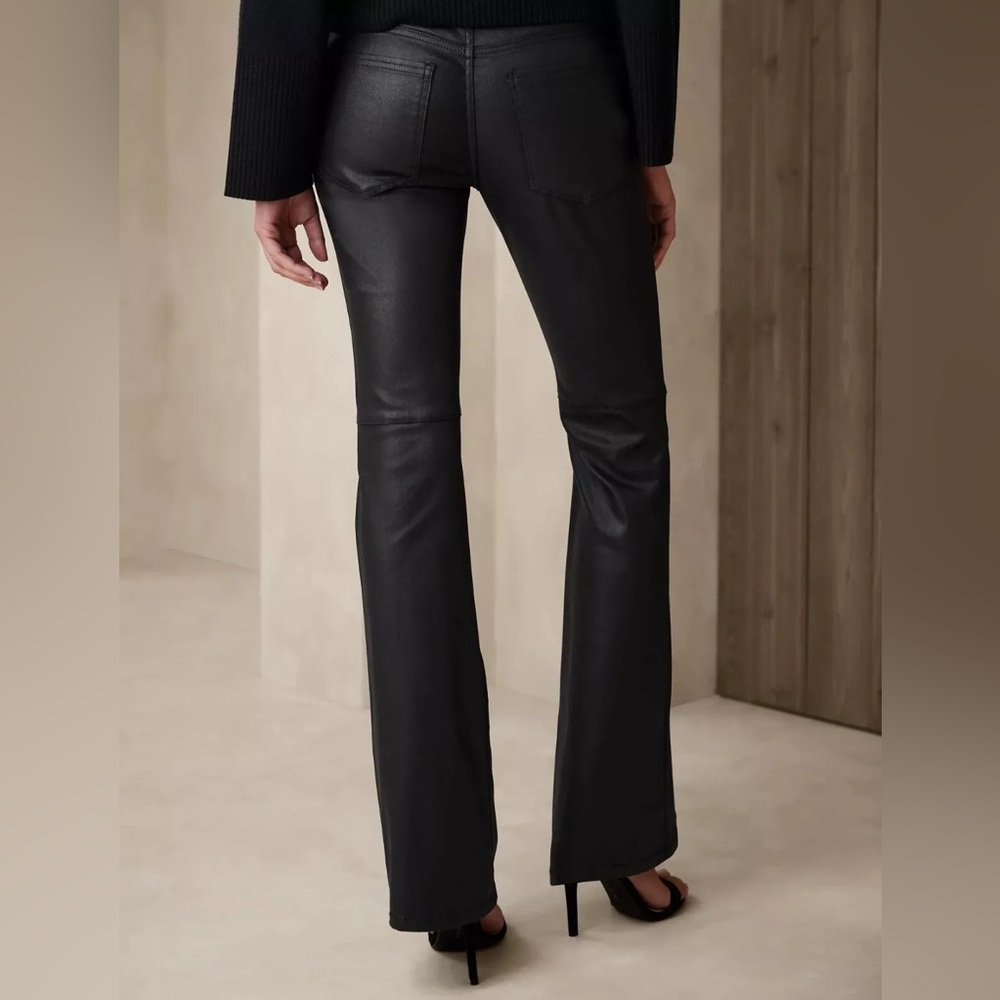 NWT Low-Rise Bootcut Coated Black Jean Size 26/2 cotton/poly blend